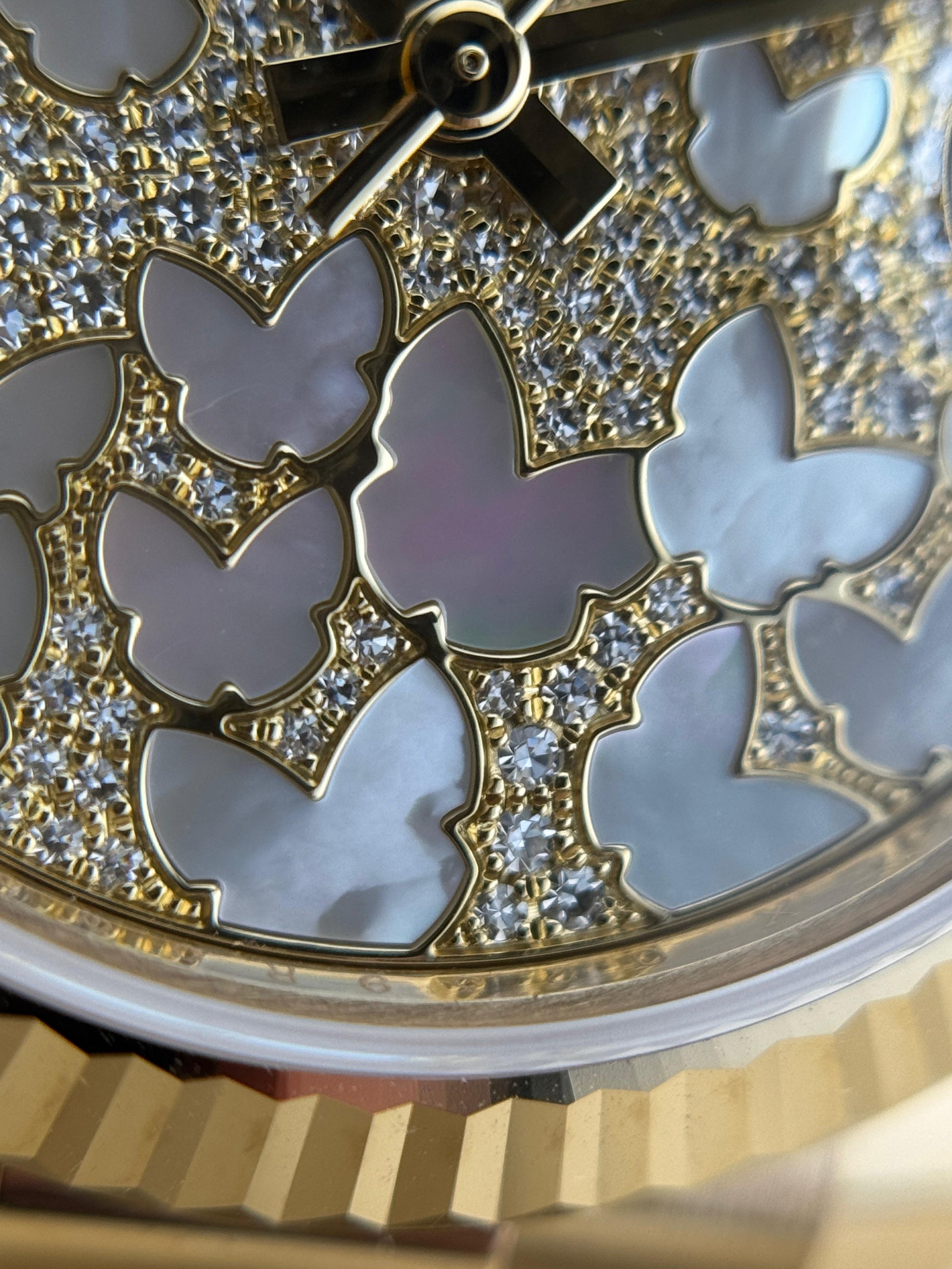 Rolex Datejust 31mm YellowGold Mother-of-pearl butterfly motifs 2021 - HOURLY 